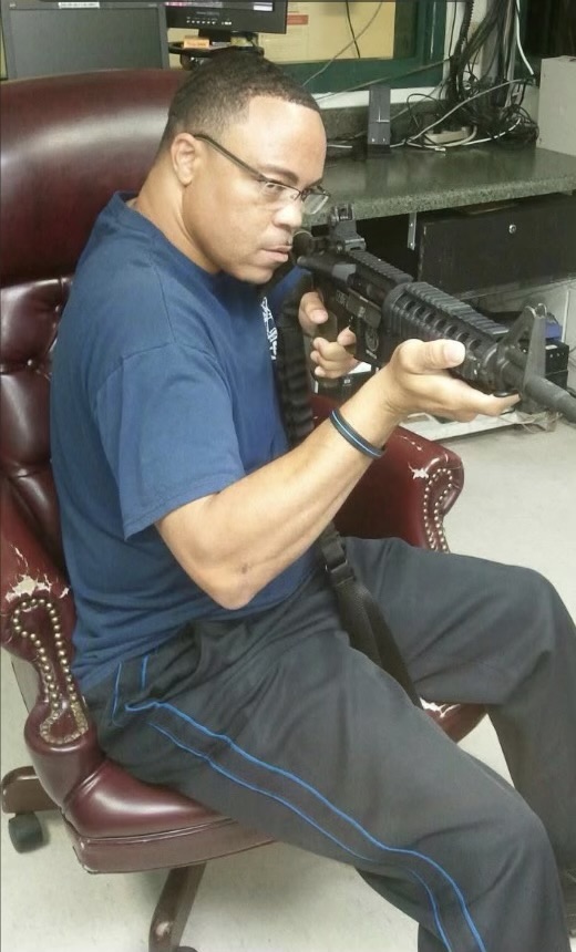 312 Defense instructor with rifle training image